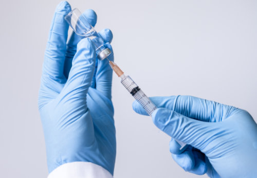 Happy,Woman,Taking,Out,A,Plate,Of,Berries,From,The